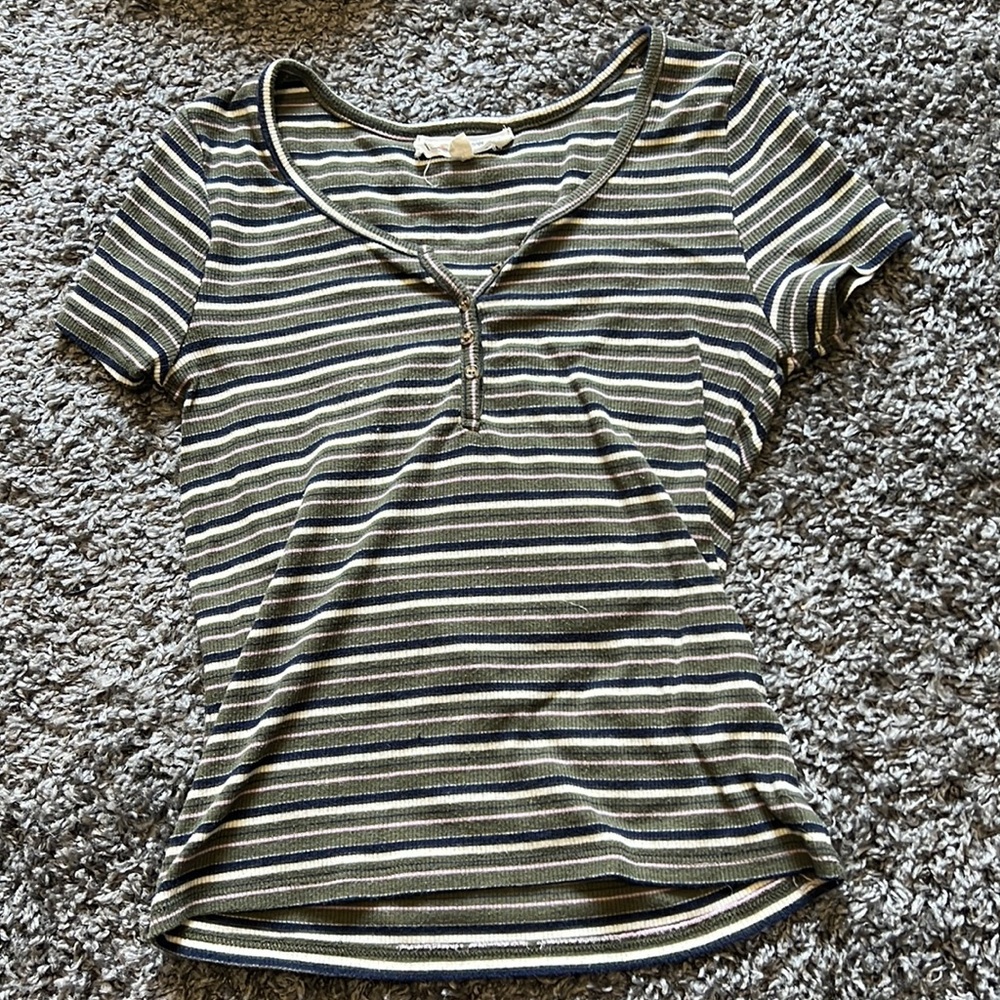 Green, pink, white, and navy blue striped shirt